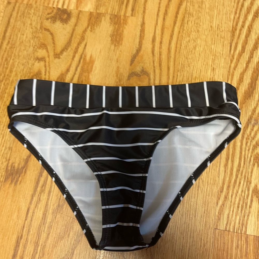 White and black striped bottoms, dark pink bottoms, and multi colored bottoms.